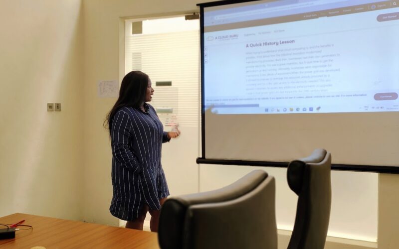 Sales manager reviewing sales pipeline and performance with a team